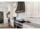 Kitchen features stainless steel appliances, marble countertops and backsplash, and custom cabinetry at 3511 N 39Th Pl, Phoenix, AZ 85018