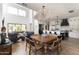 Open living and dining space with white kitchen and lots of natural light at 3511 N 39Th Pl, Phoenix, AZ 85018