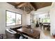 Comfortable office space with wood beam ceiling, desk, and natural light at 3511 N 39Th Pl, Phoenix, AZ 85018
