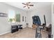 Bedroom featuring neutral walls, carpet, and a ceiling fan at 41005 W Crane Dr, Maricopa, AZ 85138