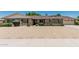 Charming brick home featuring a well-manicured gravel yard and a convenient two-car garage at 4402 W El Caminito Dr, Glendale, AZ 85302
