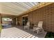 The covered patio seating offers an inviting outdoor space for relaxation at 4402 W El Caminito Dr, Glendale, AZ 85302