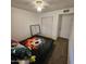 Simple bedroom with minimal decor and a soccer ball themed bedspread at 4823 W Palm Ln, Phoenix, AZ 85035