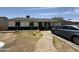 Charming single-story home with a quaint walkway and driveway parking at 4823 W Palm Ln, Phoenix, AZ 85035