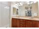 Bright bathroom boasts a double sink vanity and a shower with glass enclosure at 5450 E Deer Valley Dr # 1214, Phoenix, AZ 85054