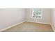 Bright bedroom with plush carpet and window with shutter-style shades at 5450 E Deer Valley Dr # 1214, Phoenix, AZ 85054
