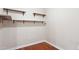Den area with hardwood flooring and floating shelves at 5450 E Deer Valley Dr # 1214, Phoenix, AZ 85054