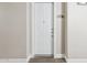 Apartment 1214 front door in a well-maintained complex entrance, providing a sense of privacy at 5450 E Deer Valley Dr # 1214, Phoenix, AZ 85054