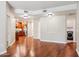 Open-concept living area with hardwood floors and views to the kitchen at 5450 E Deer Valley Dr # 1214, Phoenix, AZ 85054