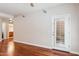Bright room with hardwood floors and modern lighting is perfect for a living space or office at 5450 E Deer Valley Dr # 1214, Phoenix, AZ 85054