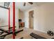Cozy bedroom with a desk and workout equipment, providing options for work and fitness at 550 W Powell Way, Chandler, AZ 85248