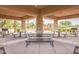 Community gathering area with shaded seating offers an ideal space for outdoor relaxation and activities at 550 W Powell Way, Chandler, AZ 85248