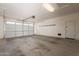 Spacious two-car garage with an automatic door opener and plenty of room for storage at 550 W Powell Way, Chandler, AZ 85248