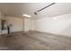 Clean and functional garage space with hot water heater and plenty of room for parking at 550 W Powell Way, Chandler, AZ 85248