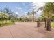 Community playground with shade structures and palm trees, providing a recreational area for residents at 550 W Powell Way, Chandler, AZ 85248