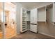 Walk-in closet with custom-designed closet system for efficient storage and organization at 550 W Powell Way, Chandler, AZ 85248