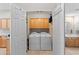 Bright laundry room with built-in cabinets, washer, and dryer at 6002 N 5Th Pl, Phoenix, AZ 85012