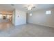 Bright living room with neutral walls, tile flooring, and natural light from the windows at 613 W Winchester Dr, Chandler, AZ 85286
