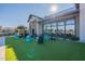 Lounge area with comfortable seating, vibrant decor, and a view of the community pool at 613 W Winchester Dr, Chandler, AZ 85286