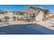 A built-in outdoor grill with a covered dining area, perfect for summer barbecues and entertaining guests at 613 W Winchester Dr, Chandler, AZ 85286