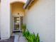 A bright, welcoming front door featuring a security screen and views into the home at 6301 S Tournament Ln, Chandler, AZ 85249