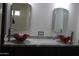 Modern bathroom featuring vessel sinks, sleek faucets, and stylish mirrors, offering a spa-like experience at 6620 W Shaw Butte Dr, Glendale, AZ 85304