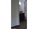 Bathroom with dark cabinet, granite countertop, and red glass vessel sink at 6620 W Shaw Butte Dr, Glendale, AZ 85304