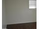 Bedroom featuring vinyl floors and window with white blinds at 6620 W Shaw Butte Dr, Glendale, AZ 85304