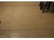 Close up shot of the garage floor with an epoxy finish that is easy to clean and maintain at 6620 W Shaw Butte Dr, Glendale, AZ 85304