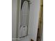Convenient storage closet with a built-in ironing board, maximizing space and organization at 6620 W Shaw Butte Dr, Glendale, AZ 85304