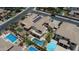 Aerial view showcasing the layout of a home with a pool, patio, and well-kept landscaping at 6840 S Crystal Way, Chandler, AZ 85249