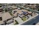 Aerial view of a home featuring solar panels, a well-maintained yard, and mature landscaping at 6840 S Crystal Way, Chandler, AZ 85249