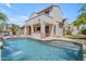 Gorgeous pool with a covered patio, outdoor BBQ, and ample seating, perfect for outdoor gatherings at 6840 S Crystal Way, Chandler, AZ 85249