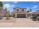 Charming two-story home featuring a two-car garage and desert landscaping at 706 N El Dorado Dr, Gilbert, AZ 85233