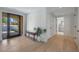 Bright entryway with modern accents and a view into a stylish bathroom at 733 W El Camino Dr, Phoenix, AZ 85021