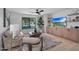Comfortable living room with built-in shelving and a view of the outdoors at 733 W El Camino Dr, Phoenix, AZ 85021