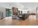 Stunning living room with fireplace and open access to pool and outdoor living at 733 W El Camino Dr, Phoenix, AZ 85021