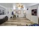 Spacious bedroom with wood-like flooring, ceiling fan, walk-in closet and natural light at 7419 S 25Th Dr, Phoenix, AZ 85041