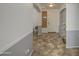 Inviting home foyer with archways, decorative tile flooring, and abundant natural light at 7419 S 25Th Dr, Phoenix, AZ 85041