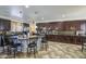 Large kitchen with granite countertops, backsplash, and dark wood cabinetry at 7419 S 25Th Dr, Phoenix, AZ 85041