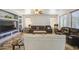 This spacious living room has a couch set and built-in shelving surrounding a television at 7419 S 25Th Dr, Phoenix, AZ 85041