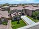 Aerial shot of a beautiful home in a well-planned community, showcasing its curb appeal at 761 W Desert Hollow Dr, San Tan Valley, AZ 85143