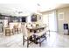 Bright dining area with sliding glass doors offering seamless indoor/outdoor living space at 761 W Desert Hollow Dr, San Tan Valley, AZ 85143