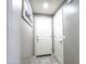 Hallway entry area featuring a door leading to the garage at 761 W Desert Hollow Dr, San Tan Valley, AZ 85143