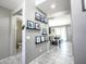 Inviting hallway with stylish decor leading to the dining area at 761 W Desert Hollow Dr, San Tan Valley, AZ 85143