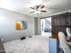 Stylish office space with sliding barn door and ample natural light at 761 W Desert Hollow Dr, San Tan Valley, AZ 85143
