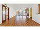 Large living room with hardwood flooring and abundant natural light at 7707 E Park View Dr, Mesa, AZ 85208
