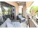 Enjoy this outdoor covered balcony with comfortable seating and stylish lighting at 7777 E Main St # 227, Scottsdale, AZ 85251