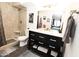 Modern bathroom features a marble vanity, tiled walk-in shower, and decor details at 7777 E Main St # 227, Scottsdale, AZ 85251