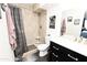 Updated bathroom featuring a walk-in shower, marble vanity, decor details, and ample space at 7777 E Main St # 227, Scottsdale, AZ 85251